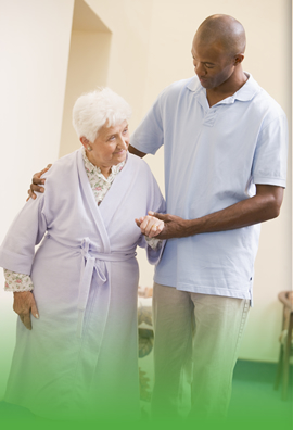 caregiver assisting elderly woman